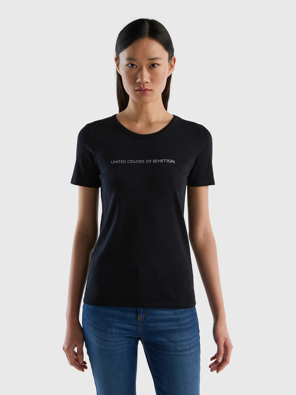 T-Shirt aus 100% Baumwolle mit glitzerndem Logoprint - Schwarz | Benetton